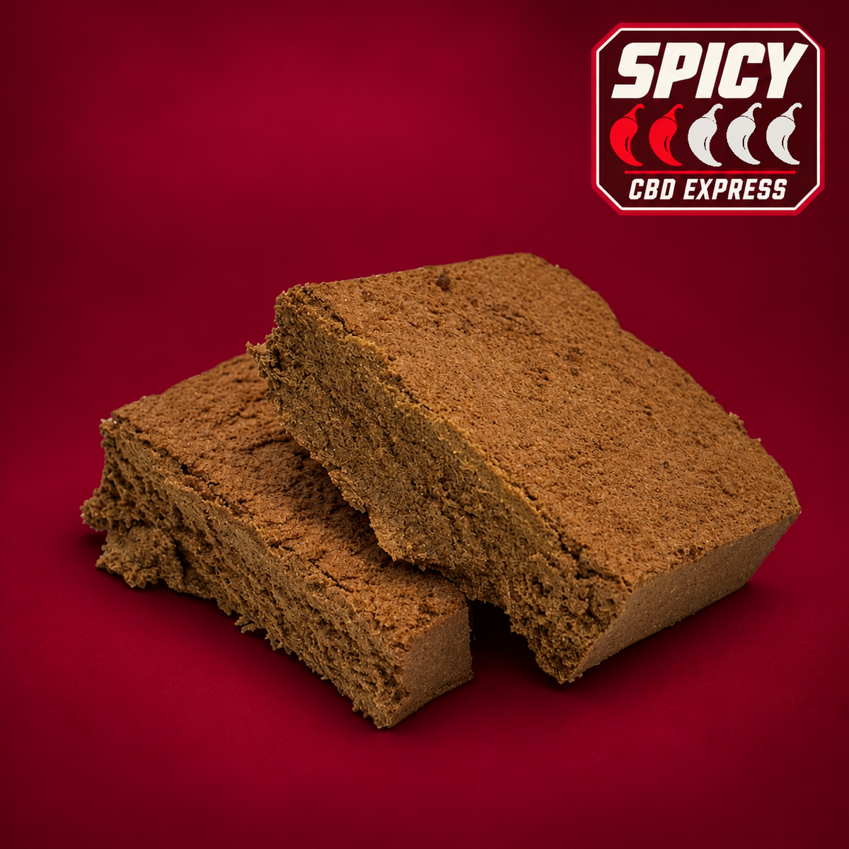 Le Mousseux CBD — photo du produit brun à texture friable, retouchée sur fond bordeaux avec badge Spicy deux piments sur cinq.